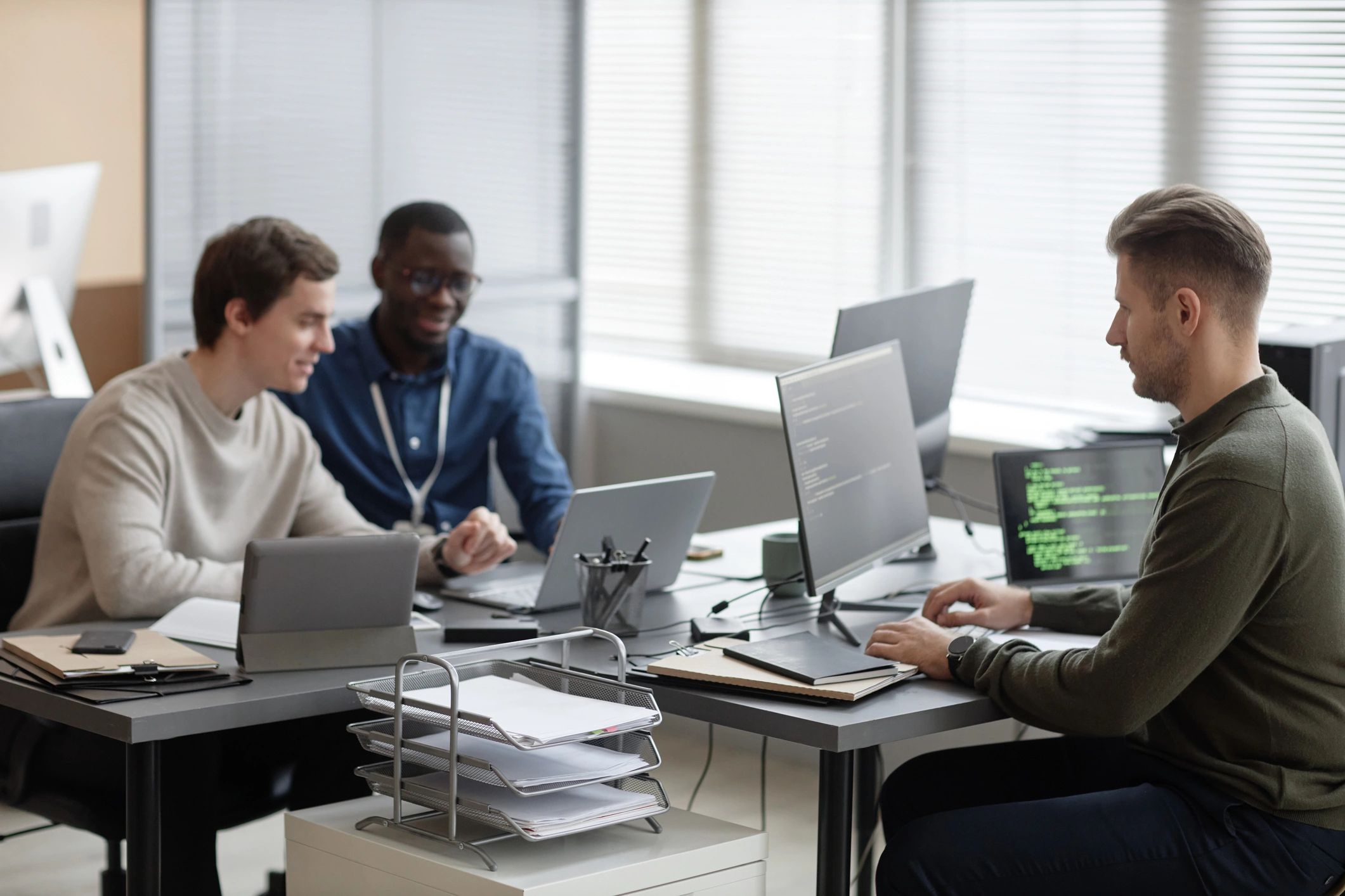 IT team working in a modern technology office