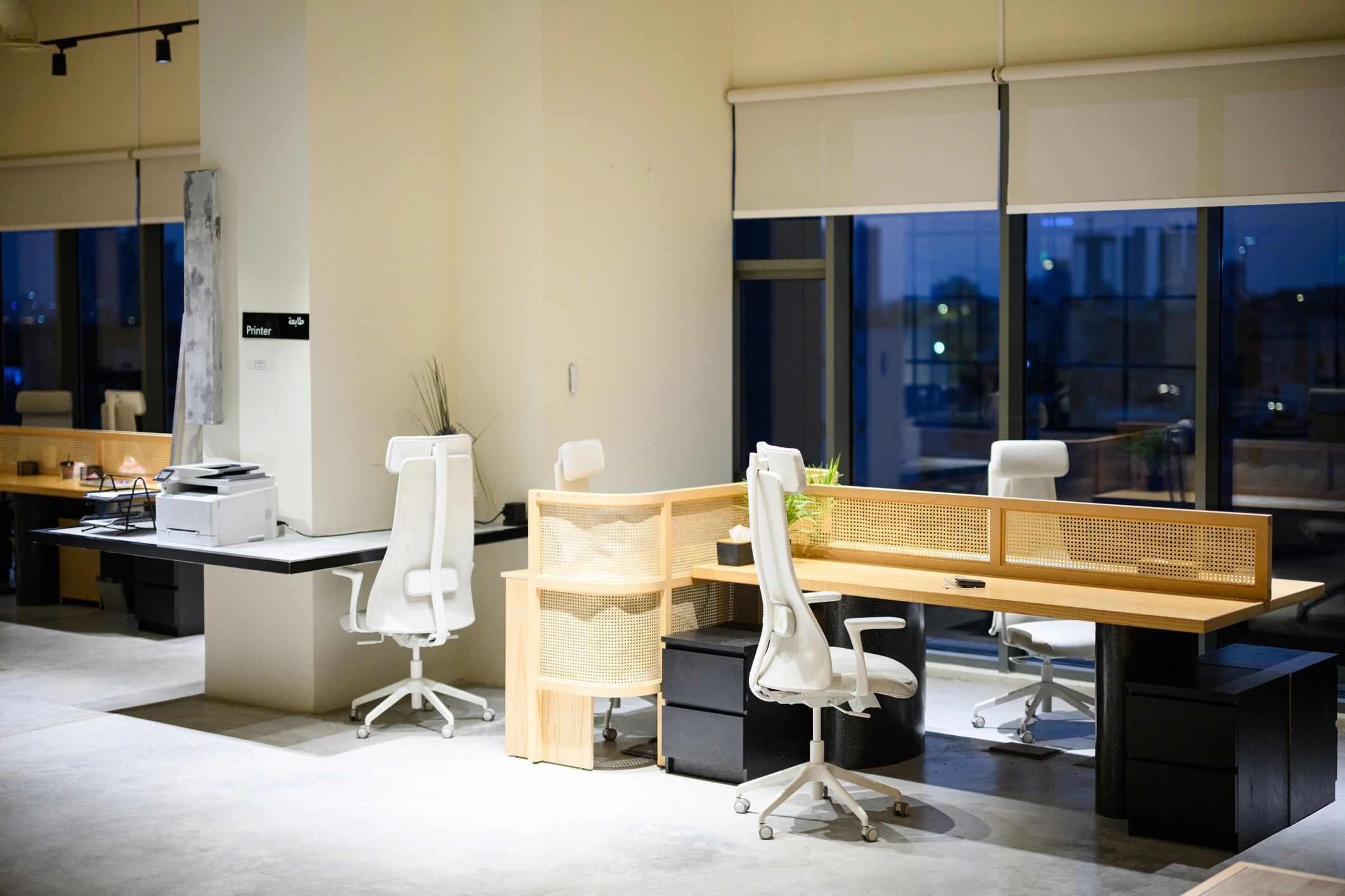 Modern IT workspace with desks and hardware-focused office setup